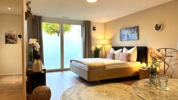 King-size bed in the stylish and bright studio