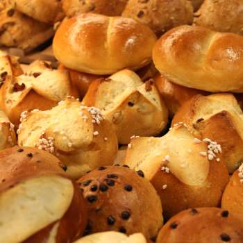 Freshly baked bread rolls and sweet pastries on display at the Balu bakery