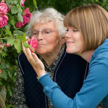 Course image: Old and young woman with roses