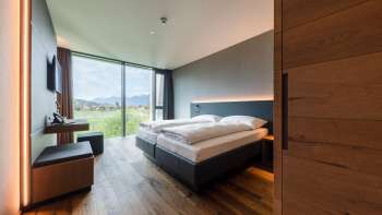 Modern double room at Hotel Kommod with a view of the countryside