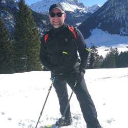 Thomas Tichy snowshoe hiking in the winter landscape of Liechtenstein - trained guide in the Alps