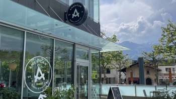Exterior view of the American Bagel & Coffee Co. with a view of the terrace 