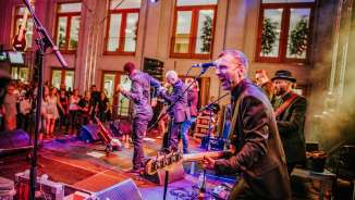 Musicians from the Soulvision Allstars on stage at the FL1.LIFE Festival in front of the government building in Vaduz