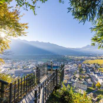 View from the panoramic terrace over the sunny Rhine Valley and the town of Vaduz.