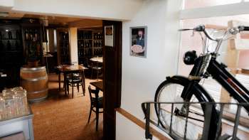 Stylish restaurant interior with classic wooden furniture and cozy ambience