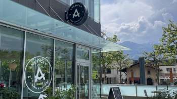 Exterior view of the American Bagel & Coffee Co. with a view of the terrace 