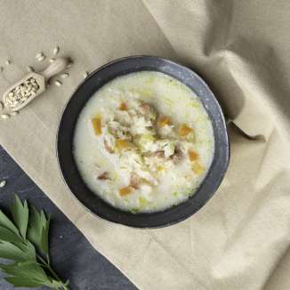 Creamy barley soup with vegetables and bacon - a traditional dish from Liechtenstein