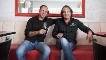 The two hosts of the Made in Italy restaurant in a relaxed atmosphere.