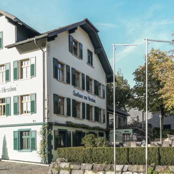 Gasthaus zum Hirschen with large outdoor area and traditional architecture