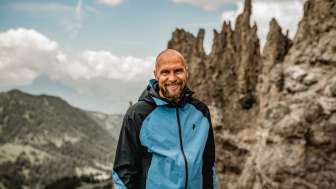 Marco Büchel hiking in the mountains of Liechtenstein Marco Büchel enjoys a hike in Liechtenstein's alpine mountain landscape in fine weather
