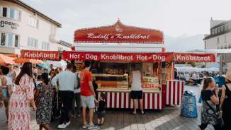 Red food truck on the town hall square in Vaduz