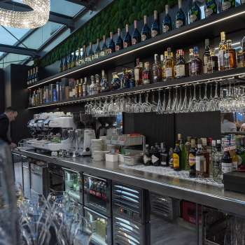 Close-up of the stylish bar in the Casino Royal Restaurant with a wide selection of drinks and modern design.