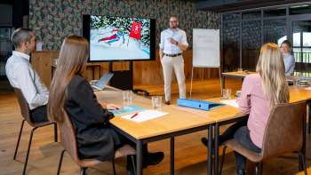 Keynote speech with Marco Büchel in a meeting room