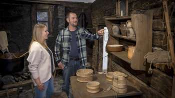 Visitors view historical everyday objects at the Walser Museum