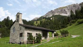 Peace chapel with mountain landscape in the background