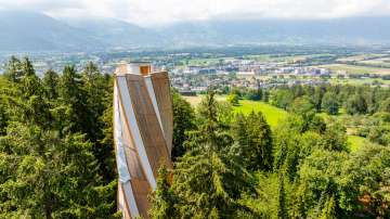 Modern observation tower on Dux in Liechtenstein, surrounded by forests with a view of the Rhine Valley