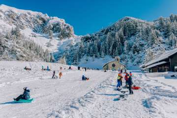 Tobogganing fun in Malbun - winter fun for families in Liechtenstein