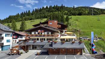 Exterior view of the Turna restaurant with summer terrace