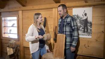 Visitors view historical everyday objects at the Walser Museum