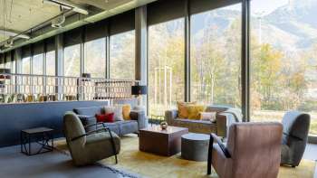Inviting lounge area at the B&B Hotel Liechtenstein-Eschen with armchairs and sofas