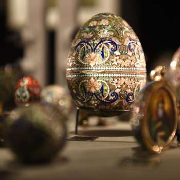 Close-up of ornately decorated Fabergé eggs in a display case at the Liechtenstein TreasureChamber