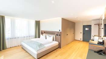 A modern and cozy double room at the Alpin Royal Hotel