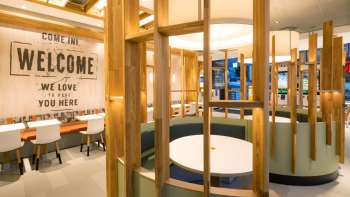Interior shot of the modern McDonald's Vaduz with various wooden elements Interior shot of the modern McDonald's Vaduz with various wooden elements