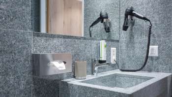 Bathroom at the Vaduzerhof by b_smart