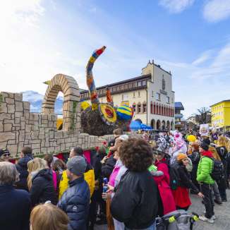 Carnival floats and people in costume at the big parade in Vaduz, Liechtenstein.