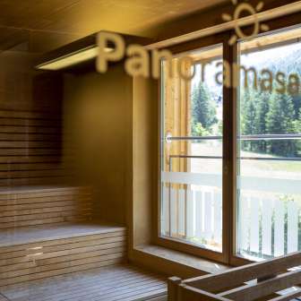 Sauna with a view of the mountains at the JUFA Hotel Malbun - relax with a view of nature and the forest