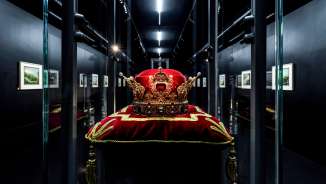 Original crown of the Principality of Liechtenstein on a red velvet cushion in the Treasury exhibition in Vaduz, impressively staged