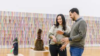Two people admire a sculpture in the Liechtenstein Art Museum