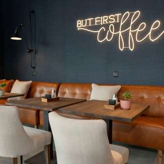 Stylish hotel with a cozy café in Vaduz. Perfect for relaxing breaks, fine coffee & modern rooms. Discover & feel good now!