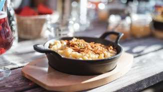 Cheese dumplings with fried onions at the Gafadura hut in Liechtenstein - regional specialty in an alpine setting