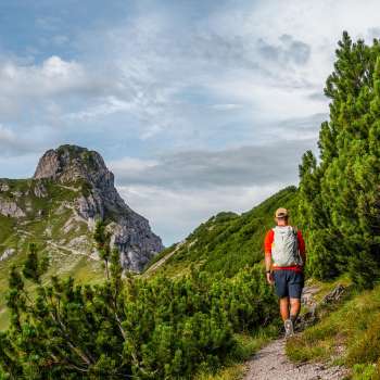 Hikers on a mountain trail in the Liechtenstein mountains