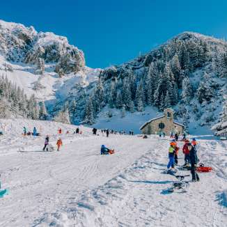 Tobogganing fun in Malbun - winter fun for families in Liechtenstein