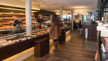 Modern bakery with a large sales area, delicious baked goods and friendly staff