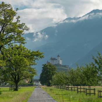 Sweeping views of the valley and surrounding mountains from Gutenberg Castle on a clear day.