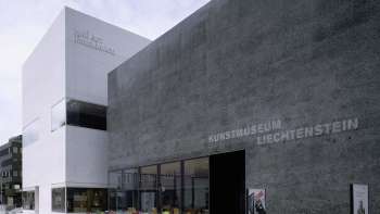 Exterior view of the modern Liechtenstein Art Museum in Vaduz with black façade