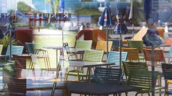 Outdoor area of the kiosk at the Mühleholz Swimming Pool, with seating