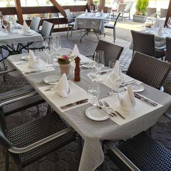 Close-up of a table setting in the outdoor area with lovely decoration