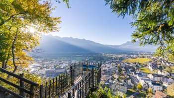 View from the panoramic terrace over the sunny Rhine Valley and the town of Vaduz.