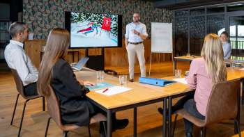 Keynote speech with Marco Büchel in a meeting room