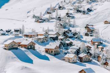 Snow-covered chalets and holiday homes in the ski resort of Malbun, nestled in the Liechtenstein Alps - that's the way it should always go