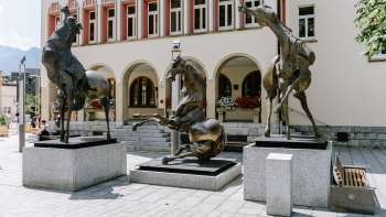 Bronze sculpture Tre Cavalli by Nag Arnoldi in front of the government building in Vaduz. Bronze sculpture Tre Cavalli by Nag Arnoldi in front of the government building in Vaduz.