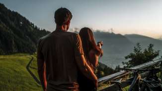 Couple enjoying the view from the Gafadurahütte hut